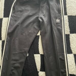 Adidas Men's Black track pants with White Stripes
